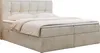 A beige upholstered boxspring bed with a tufted headboard and two storage drawers visible. Produktbild-Vorschau
