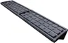 A gray shelf insert with a grid of rectangular indentations, shown at an angle against a white background. Produktbild-Vorschau