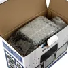 A product box containing a lamp wrapped in bubble wrap. Anteprima dell’immagine prodotto