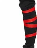 A close-up view of a black pant leg with red ribbon-like material wrapped around it in a spiral pattern. Produktbild-Vorschau