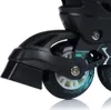 Close-up of the wheel and frame of a black inline skate. Produktbild-Vorschau