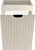 A close-up view of a beige bathroom cabinet with a ribbed front and a black handle cutout, set against a white background. Produktbild-Vorschau