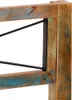A close-up view of the corner of a wooden bed frame with black metal accents. Náhled obrázku produktu