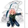 Sakura Haruno figure with a slug-like creature in the background, against a white background with stylized clouds. Náhled obrázku produktu