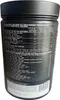 The image shows the side of a black plastic container of ESN Designer Whey protein powder, with detailed nutritional information and ingredients printed on it. Produktbild-Vorschau