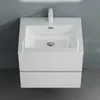 A white bathroom vanity with a sink and faucet, mounted on a gray wall. Produktbild-Vorschau