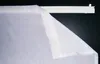 A close-up of a white sheer curtain hanging from a white curtain rod. Produktbild-Vorschau