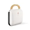 A white sandwich maker with a wooden handle is shown against a white background. Podgląd zdjęcia produktu
