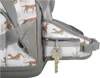 A close-up view of a backpack's side pocket with a key attached. Náhled obrázku produktu