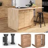 A modern kitchen with a light wood island and a black stool. Podgląd zdjęcia produktu