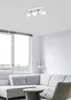A modern living room with a sectional sofa, coffee table, and a large window. Produktbild-Vorschau