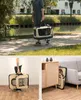 Collage of a person carrying a pet carrier outdoors, a person holding a folded pet carrier, and a folded pet carrier next to furniture. Anteprima dell’immagine prodotto