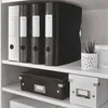 A shelf with office binders and storage boxes. Voir les images du produit