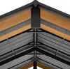 Close-up view of the roof structure of a gazebo or carport, showing wooden beams and dark metal supports. Náhled obrázku produktu