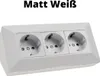 A white triple electrical socket outlet mounted on a surface. Produktbild-Vorschau