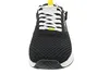 A front view of a black sneaker with white laces and yellow accents. Voir les images du produit