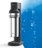 A Brita water carbonator with a stainless steel bottle is shown against a blue background with bubbles. Produktbild-Vorschau