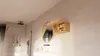 A modern bathroom with a wall-mounted cabinet, mirror, and sink. Produktbild-Vorschau