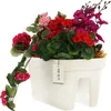 A white balcony planter filled with artificial flowers. Anteprima dell’immagine prodotto
