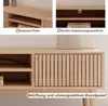A collage of images showing details of a wooden TV stand, including its construction and features. Produktbild-Vorschau