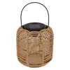 A rattan solar lantern with a black handle and a solar panel on top, set against a white background. Anteprima dell’immagine prodotto
