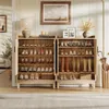 A hallway or entryway with a wooden shoe cabinet filled with shoes and boots. Podgląd zdjęcia produktu