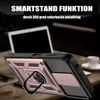 A close-up of a phone case with a ring holder, placed on a wooden table with a laptop and a cup in the background. Produktbild-Vorschau