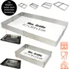A rectangular baking frame is shown with its maximum and minimum size dimensions indicated by text and smaller examples of the frame in use. Anteprima dell’immagine prodotto