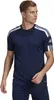 A man wearing an Adidas t-shirt and shorts, posing for a product shot. Voir les images du produit