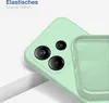 A close-up view of a light green smartphone case, showing the camera cutout and the interior texture. Produktbild-Vorschau