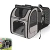 A gray and black expandable pet carrier backpack is shown against a white background. A smaller inset image shows a child and a cat with the backpack. Produktbild-Vorschau