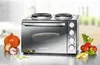 A multi-functional oven with two stovetop burners, surrounded by fresh produce. Produktbild-Vorschau