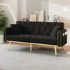 A black velvet sofa with gold legs is displayed in a living room setting. Anteprima dell’immagine prodotto