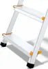 Close-up view of the lower steps of an aluminum ladder. Anteprima dell’immagine prodotto
