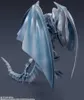 A close-up, angled view of a Blue-Eyes White Dragon action figure. Produktbild-Vorschau