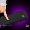 A hand is pressing down on a black wrist rest with the PREYON logo visible. Podgląd zdjęcia produktu