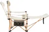 A beige camping chair with an extended footrest, shown from the side against a white background. Produktbild-Vorschau