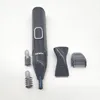 A black Philips nose trimmer with several attachments is laid out on a white background. Podgląd zdjęcia produktu