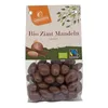 A bag of chocolate-covered almonds with cinnamon. Anteprima dell’immagine prodotto