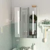 A bathroom cabinet with integrated lighting is shown mounted on a wall above a sink. Produktbild-Vorschau