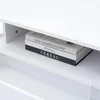 A close-up view of two books stacked on a white shelf. Voir les images du produit