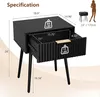 A diagram showing the specifications of a black nightstand with an open drawer. Produktbild-Vorschau
