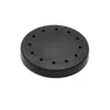 A black, circular object with small square indentations around its perimeter, set against a white background. Náhľad obrázku produktu