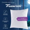 A white quilted pillow is shown against a dark blue background with text and icons describing its features. A moonlit night sky is visible through a window in the background. Produktbild-Vorschau