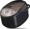 A Zojirushi rice cooker is shown from a slightly elevated front-side angle against a white background. Produktbild-Vorschau