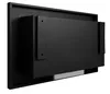 The back of a black ethanol fireplace with mounting brackets. Voir les images du produit