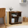 A wooden roll cabinet with shelves and drawers is placed on a wooden floor next to a chair and a desk. Anteprima dell’immagine prodotto