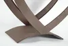 A close-up view of the base of a metal firewood rack with a heart shape. Produktbild-Vorschau
