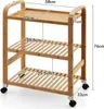 A three-tiered bamboo serving cart with dimensions indicated by text overlays. Podgląd zdjęcia produktu