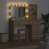 A vanity table with a mirror and shelves, illuminated by lights around the mirror. Náhled obrázku produktu